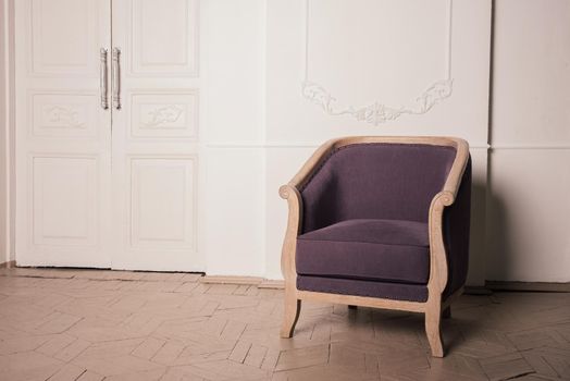 antique violet oak armchair in the interior