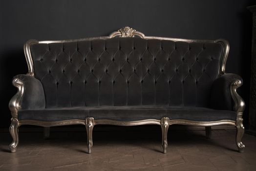 beautiful vintage sofa in a retro interior. Vintage background.