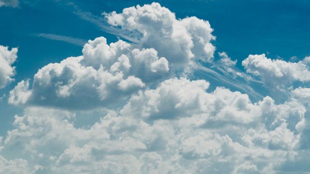 Incredibly wonderful lush cumulus clouds against a blue sky - Image
