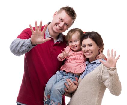 couple and their little daughter with palms up isolated on white background