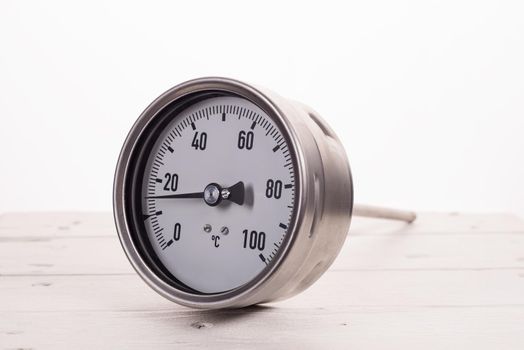 Manometric thermometer. Close-up on a white background.