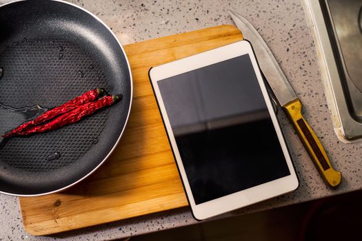 Red Chilli Peppers in a Frying Pan good photo