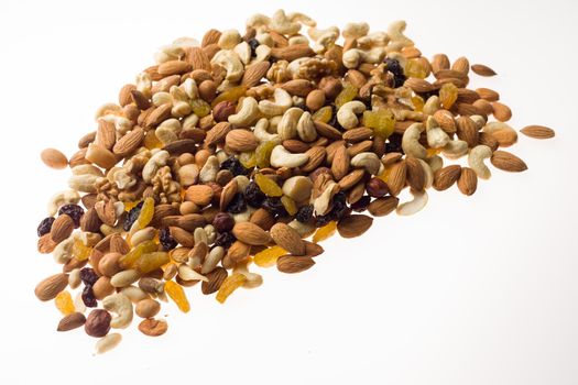 Mix of nuts and dried fruits. Cashew, almonds, macadamia, hazelnuts, Brazilian, walnuts, raisins, peanuts - image