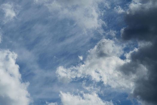 Beautiful fluffy white clouds against the blue sky - Image