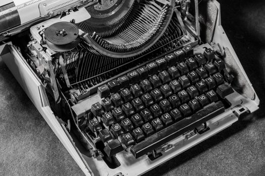 Retro styled image of an old typewriter on a table