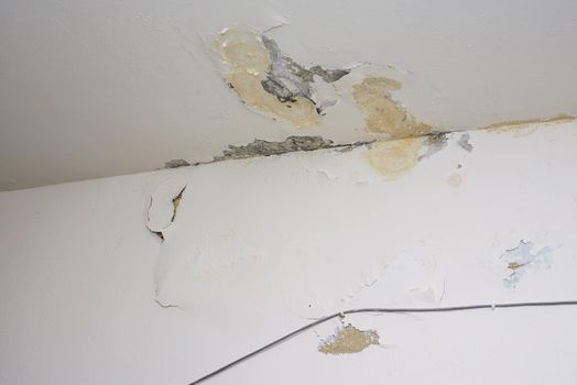 Damage ceiling from water pipelines leakage. Housing problem concept - image