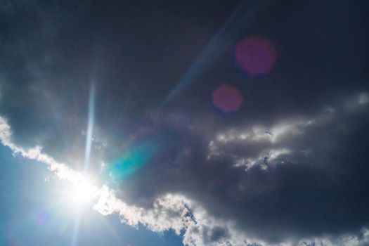 The sun shines bright in summer. Blue sky and clouds.- image