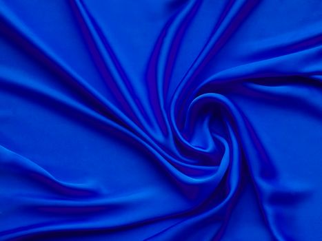 luxurious blue satin background close up for postcard or abstracted wallpaper