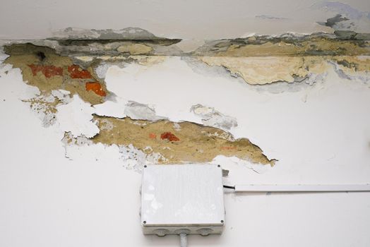 Damage ceiling from water pipelines leakage. Housing problem concept - image