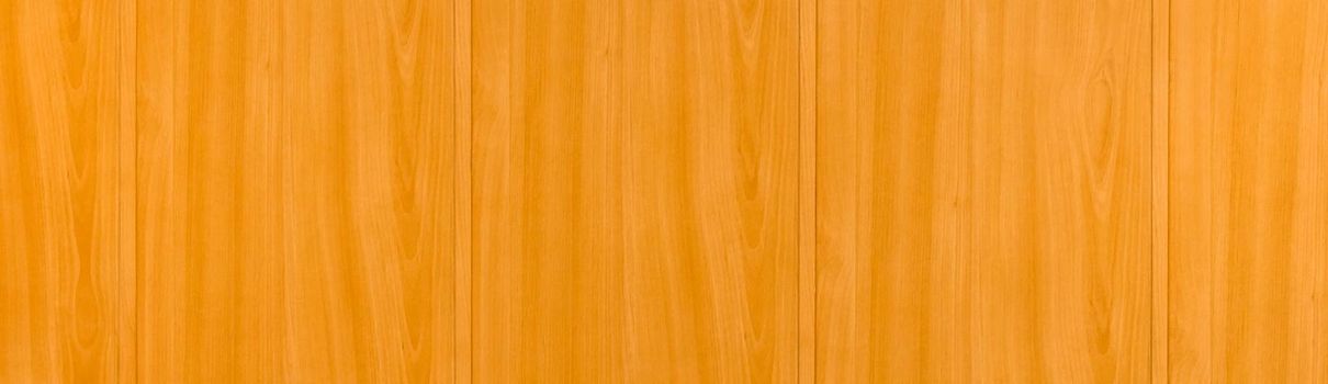 Light orange wooden wallpaper horizontal panel modern interior plank texture background.