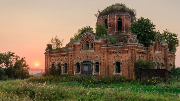 abandoned rural church in the evening. Russia