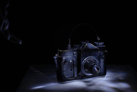 Old retro camera . light brush