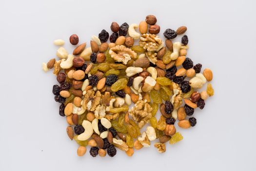 Mix of nuts and dried fruits. Cashew, almonds, macadamia, hazelnuts, Brazilian, walnuts, raisins, peanuts - image