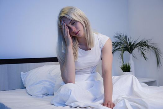 Depressed woman awake in the night, she is exhausted and suffering from insomnia - Image