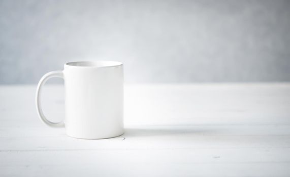 clean white cup on a table close up