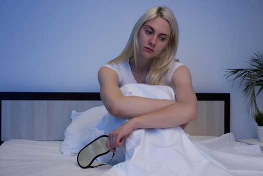 Sleep Disorders, insomnia. Woman Suffering From Depression Sitting On Bed In Pajamas - Image