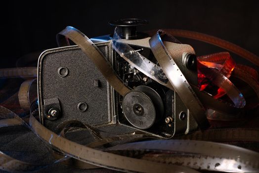 old film and the insides of the vintage camera on the table.