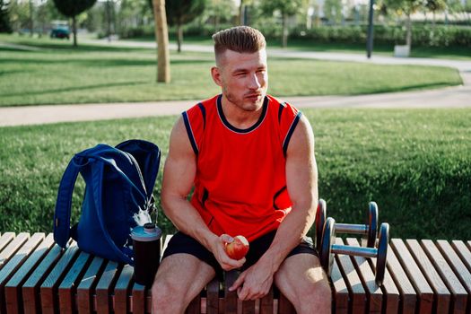 sporty man in the park workout exercise fitness motivation. High quality photo