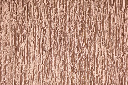brown background facade plaster. Exterior building structure backdrop. Silica sand cement wall.