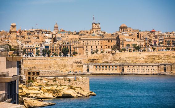 picturesque view on Valletta coastal architecture from the sea in Malta