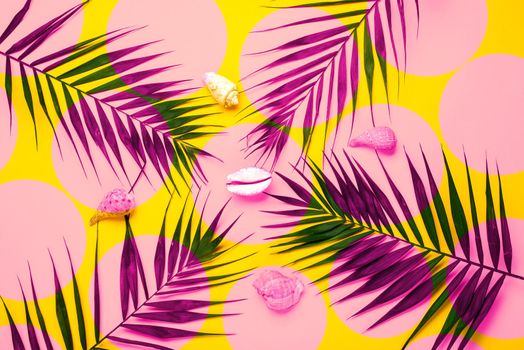 Flat lay traveler accessories with palm leaf, seashells . Top view travel or vacation concept. Summer background.