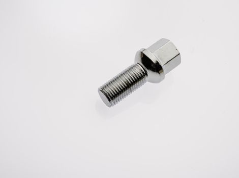 One car wheel bolts isolated on white background with copyspase - Image
