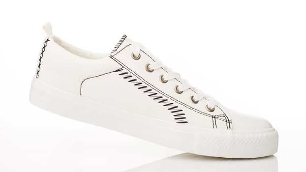 Fashionable white walking shoes on a white background. - image