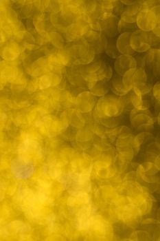 Abstract christmas lights glitter background. christmas gold texture background.