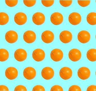 Colorful fruit pattern of fresh orange slices on background. From top view