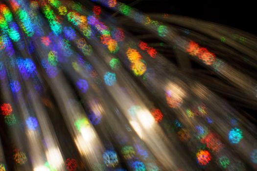 Christmas background. Festive abstract background with bokeh defocused lights and stars.