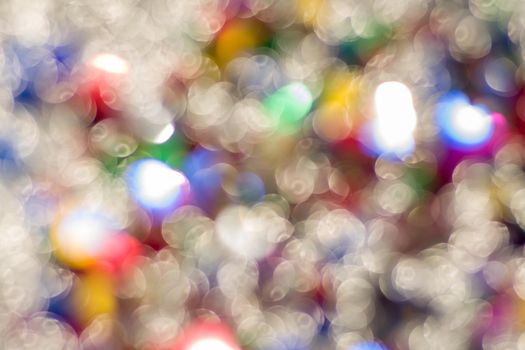 Abstract glitter color lights chrismas background. de-focused - image