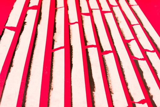 close up of an adhesive tape on red background.