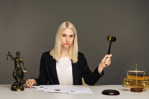 advice and justice concept. Justice scales, justice hammer and Litigation document, female lawyer working legal law with use laptop at lawyer office.