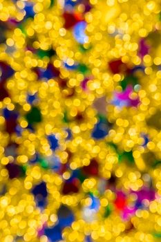 Abstract golden color lights chrismas background. de-focused - image