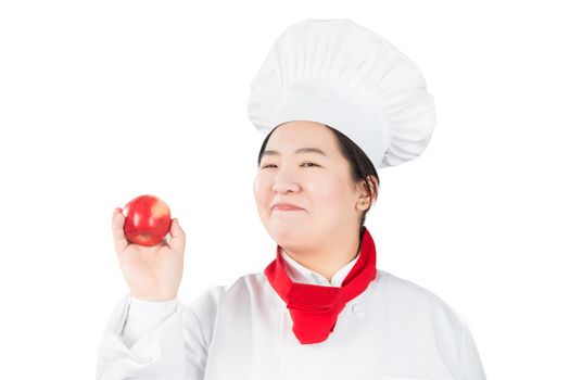 cooking and food concept - smiling female chef, holding a red apple