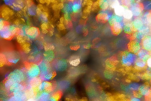 Christmas background. Festive abstract background with bokeh defocused lights and stars.