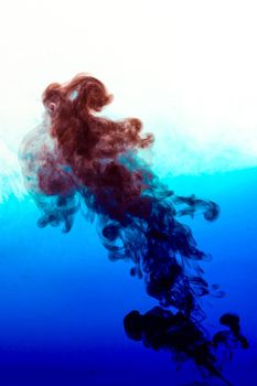 Cloud of ink in water isolated on white. Color of the year 2020. - image