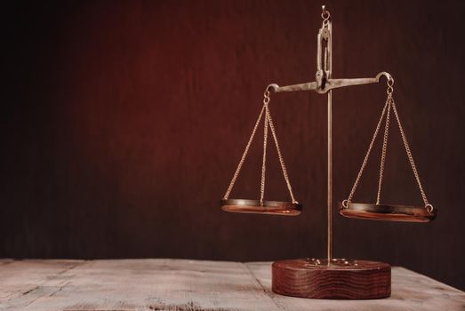 Law scales on table. Symbol of justice - Image