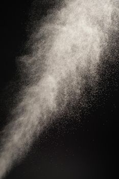 close up of spray water on black background - image