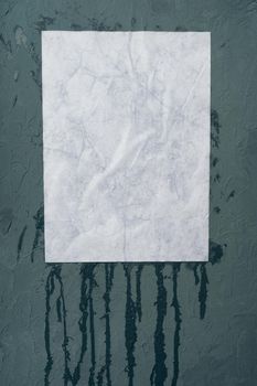 Wet white paper glued to the wall. Wet paper texture. - image