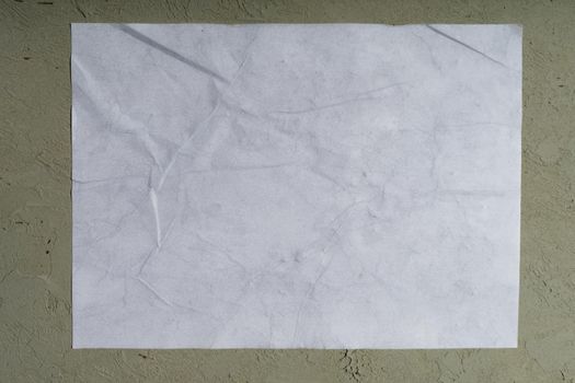 Wet white paper glued to the wall. Wet paper texture. - image