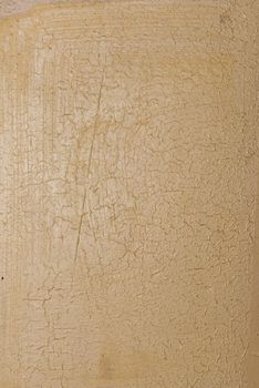 Close-up detail of cracked paint on rusty metal wall. - image