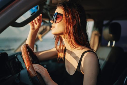 woman driving in car trip posing fashion travel. High quality photo