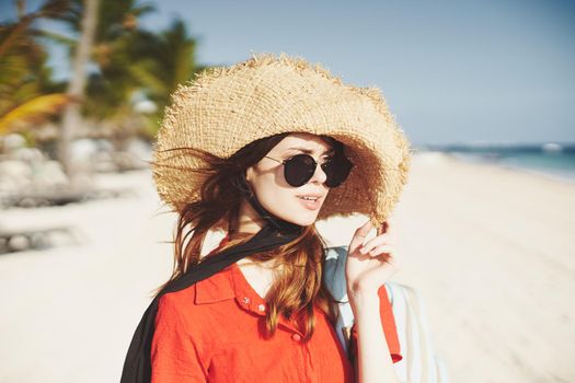 woman in hat on island landscape summer tropics. High quality photo