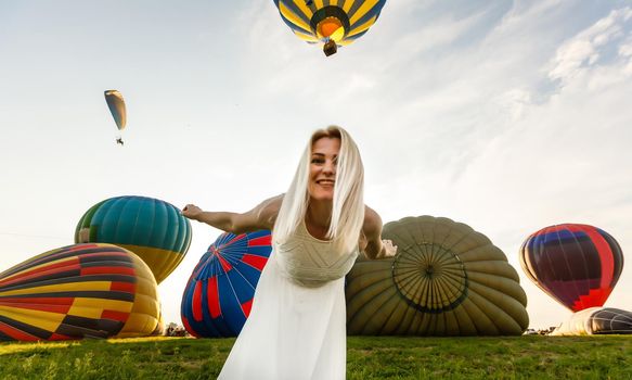 woman and a hot air balloon, summer