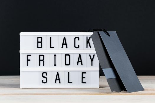Black Friday sale. Label and lightbox on a dark background. Banner for advertising.