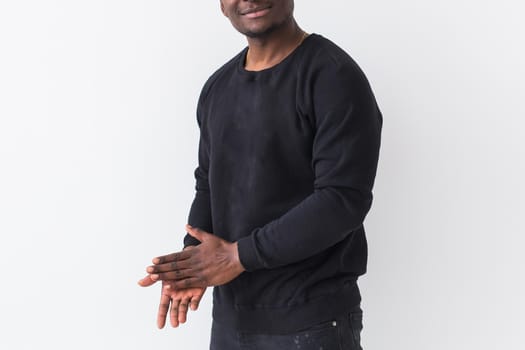 Young handsome african american man with an afro hairstyle. Portrait on white background
