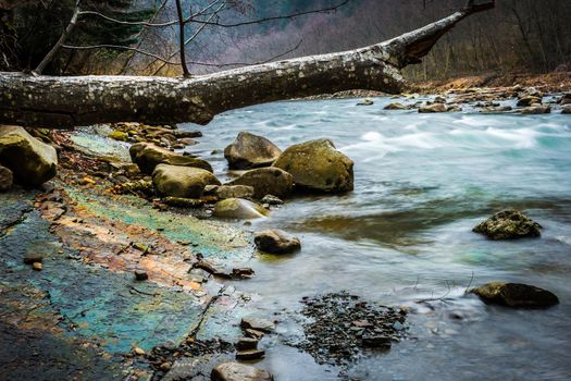 beautiful landscape with river flowing in mountains