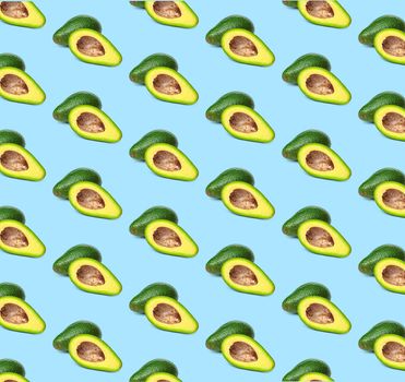 Avocado pattern on color background. Top view. Banner. Pop art design, creative summer food concept