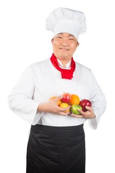 man in chef's hat with fruits on a white background